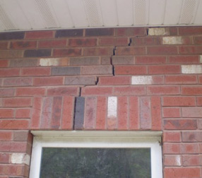 cracking brick wall